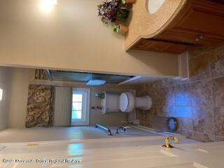 51 Homestead Road Freehold, NJ 07728 - Photo 10 of 20 a view of a room with gym equipment