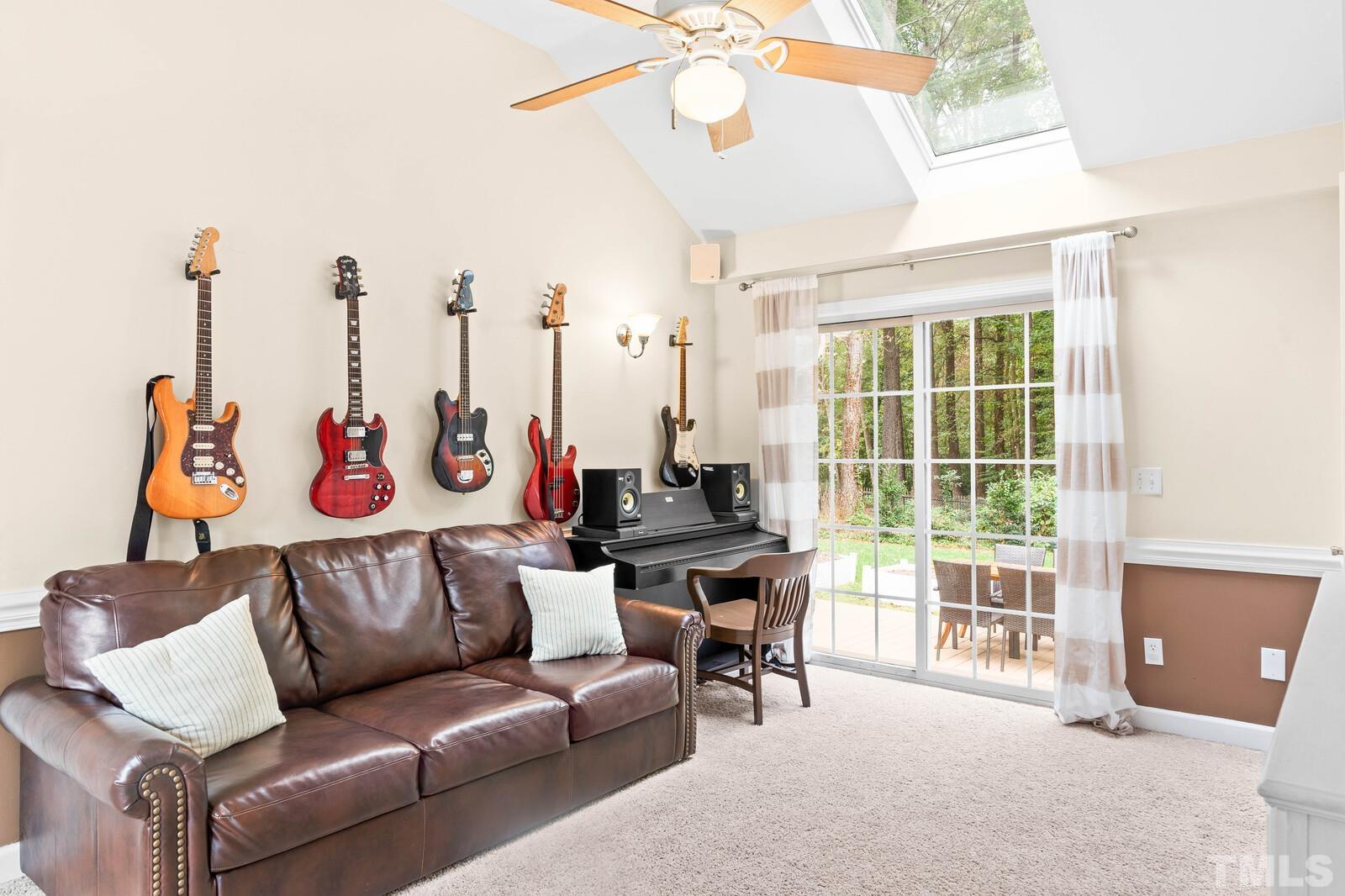 8312 Heel Stone Court Raleigh, NC 27613 - Photo 12 of 30 a view of a livingroom with furniture and window