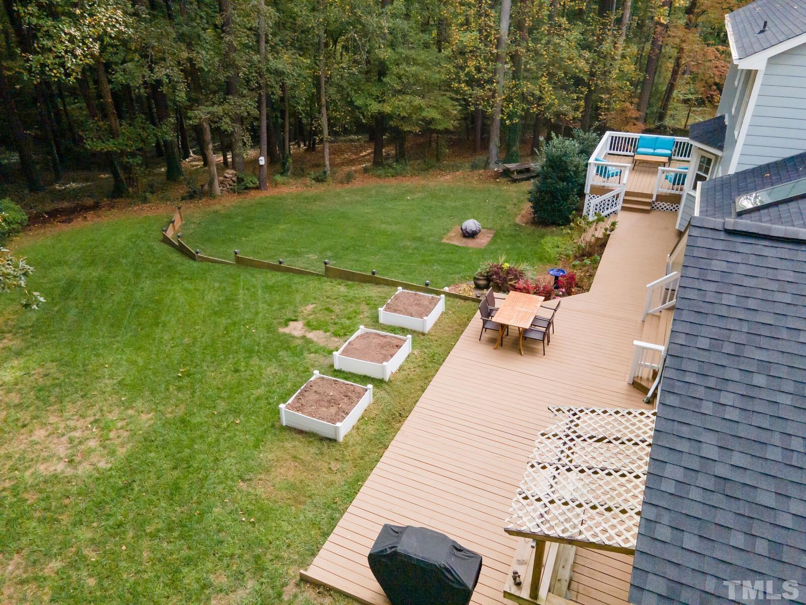 8312 Heel Stone Court Raleigh, NC 27613 - Photo 25 of 30 an aerial view of a house with a yard