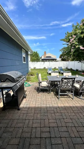a view of a terrace with seating space