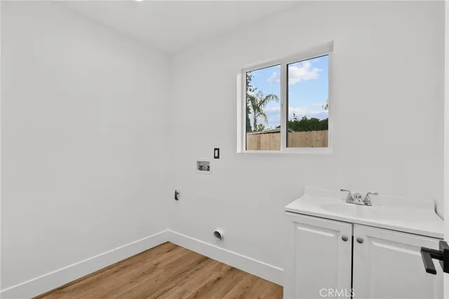 a bathroom with a sink and a window