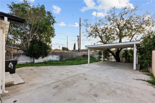 a view of backyard with tree