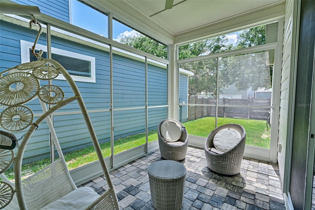 6464 Southwest 77th Street Gainesville, FL 32608 - Photo 4 of 41 a view of a porch with furniture and garden