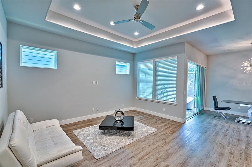 6464 Southwest 77th Street Gainesville, FL 32608 - Photo 6 of 41 a living room with furniture and a window