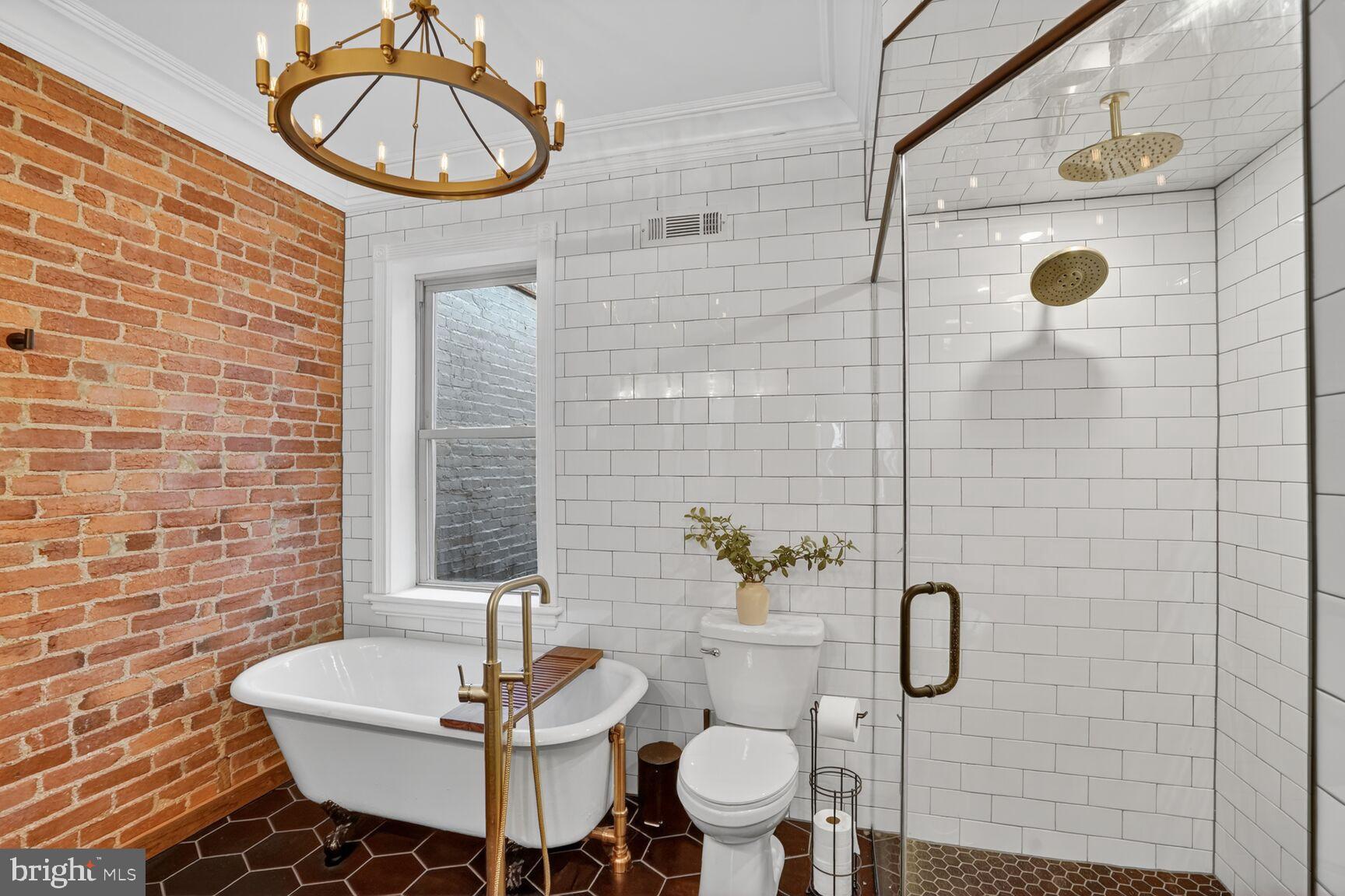 1316 Florida Avenue Northwest Washington, DC 20009 - Photo 20 of 43 a bathroom with a sink a mirror and a shower