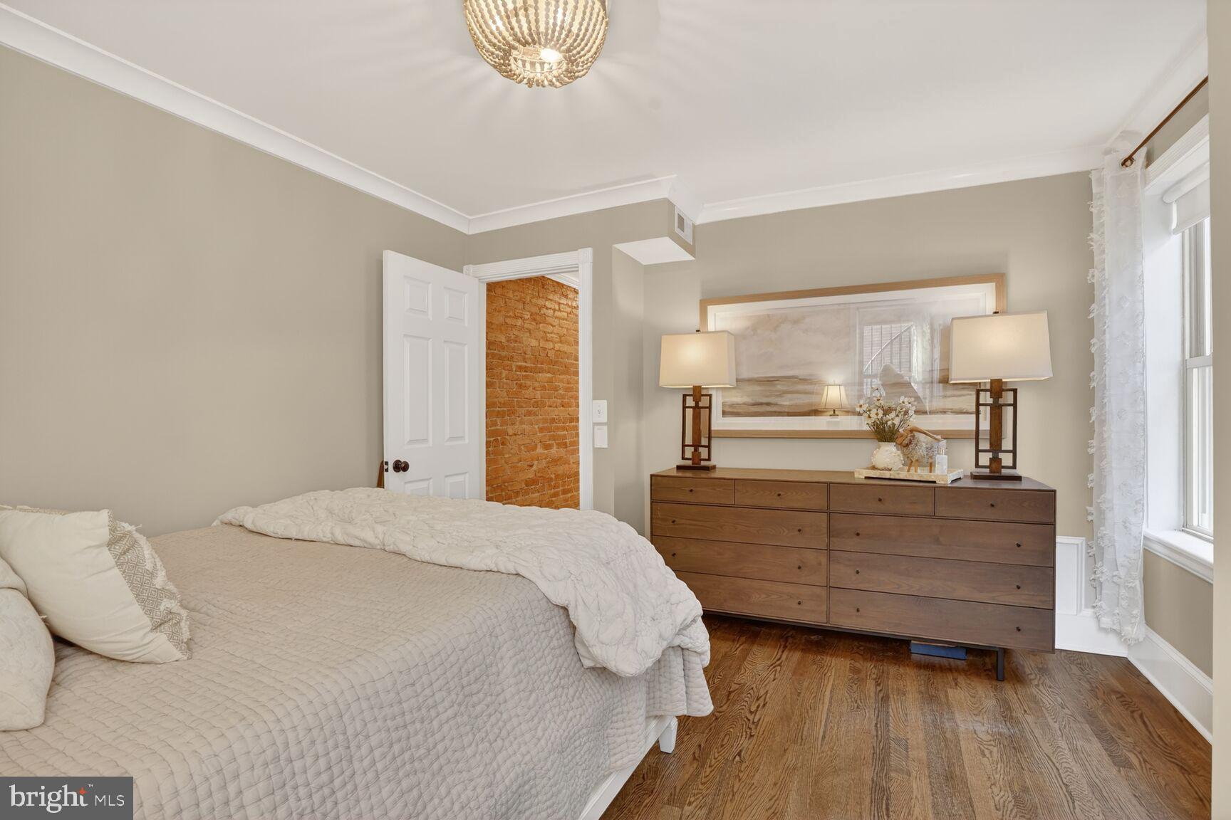 1316 Florida Avenue Northwest Washington, DC 20009 - Photo 23 of 43 a room with a bed and a view of bedroom