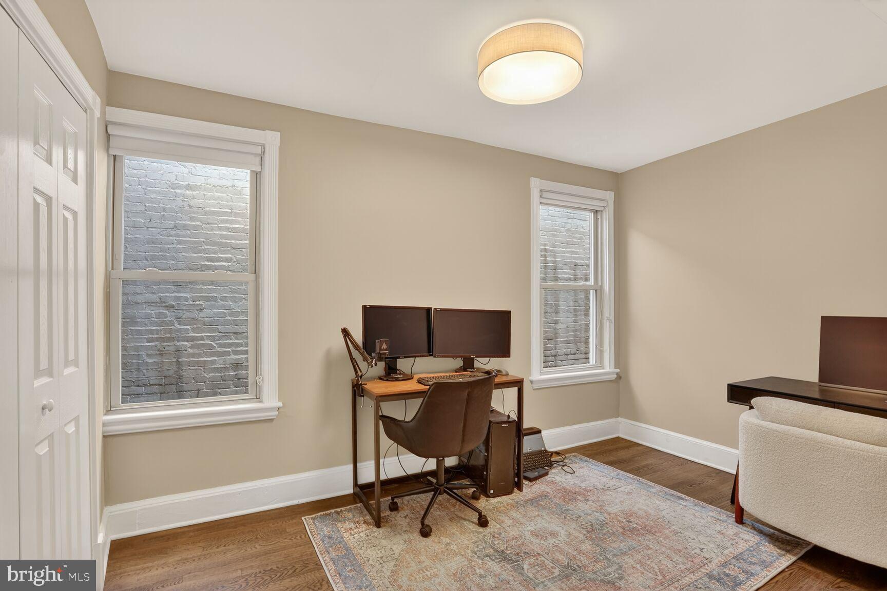 1316 Florida Avenue Northwest Washington, DC 20009 - Photo 24 of 43 a view of a workspace with furniture and a window