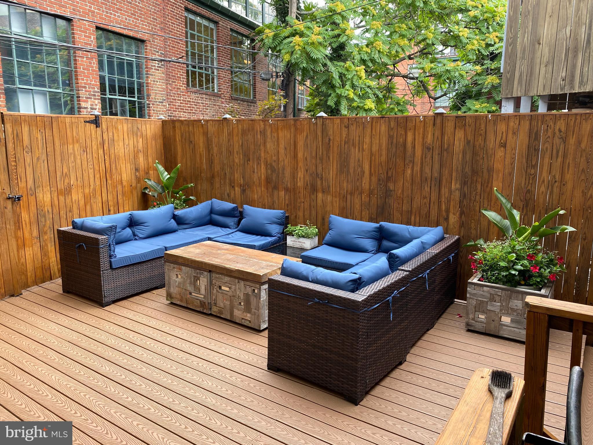 1316 Florida Avenue Northwest Washington, DC 20009 - Photo 42 of 43 a view of a wooden deck with furniture