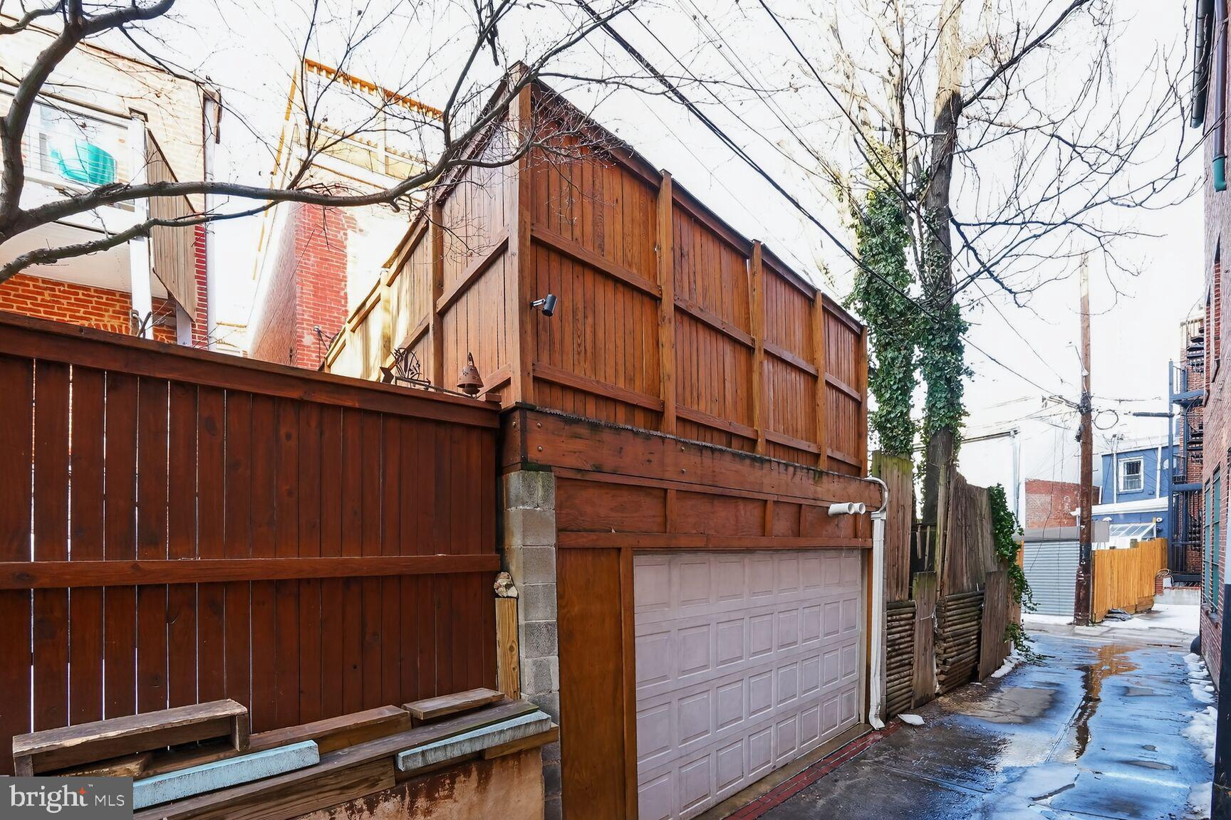 1316 Florida Avenue Northwest Washington, DC 20009 - Photo 43 of 43 a view of a house with wooden fence
