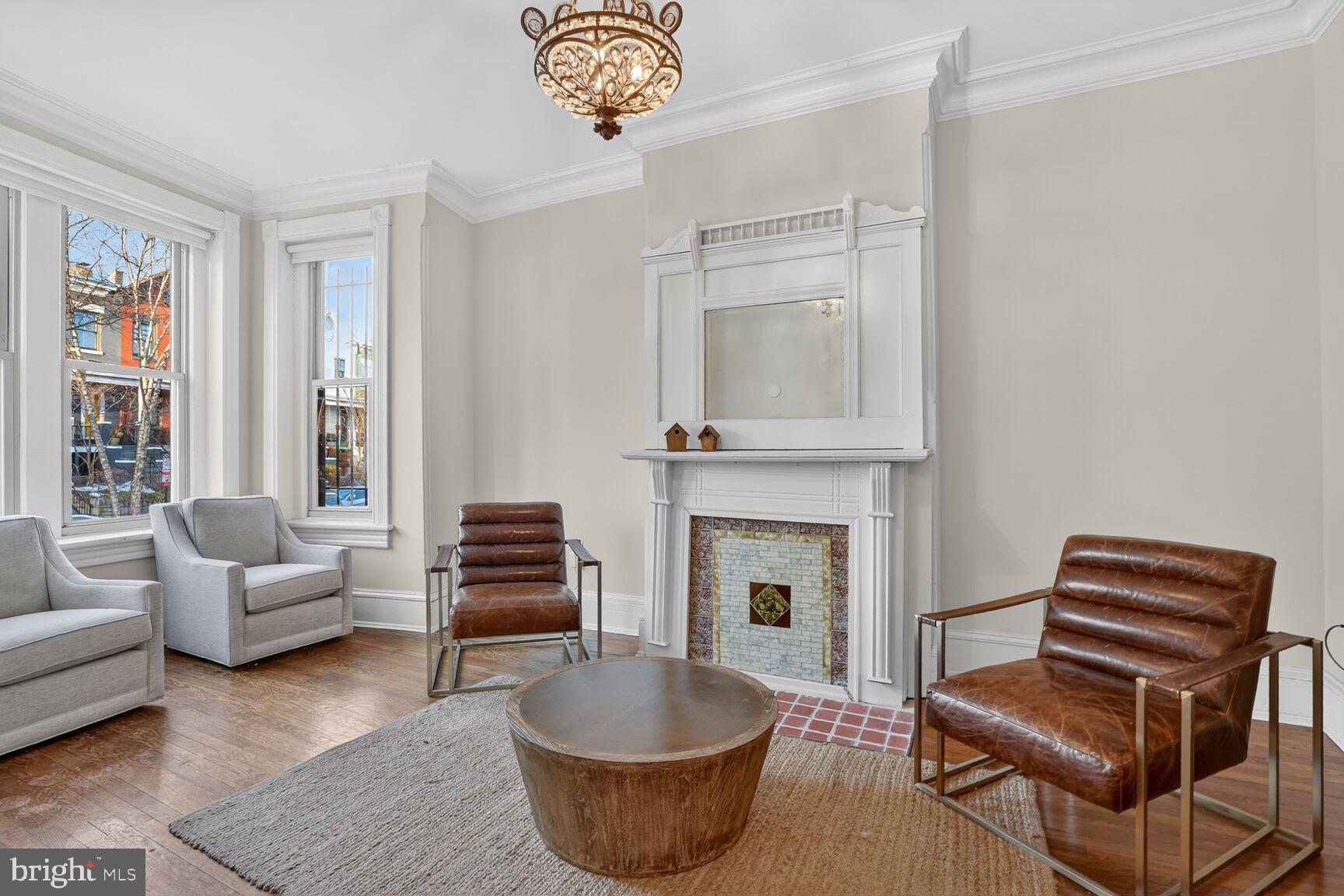 1316 Florida Avenue Northwest Washington, DC 20009 - Photo 6 of 43 a living room with furniture and a fireplace