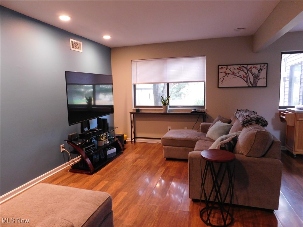987 Hampton Ridge Drive Akron, OH 44313 - Photo 21 of 49 Living room wood like finished floors and recessed lighting