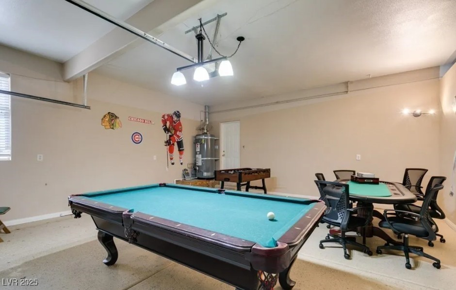 6520 Turtle Hill Road Las Vegas, NV 89110 - Photo 21 of 59 Rec room featuring pool table, a garage, secured water heater, and beamed ceiling