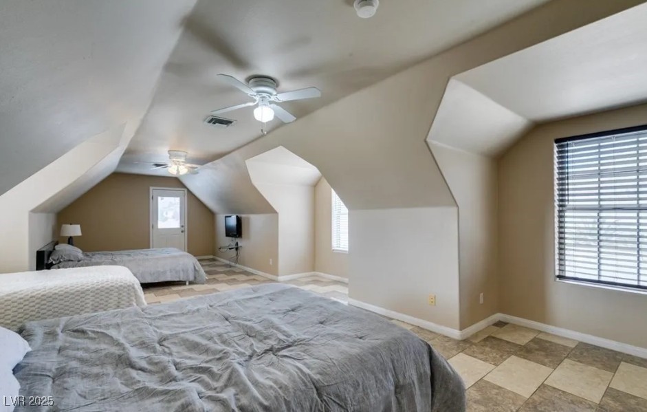 6520 Turtle Hill Road Las Vegas, NV 89110 - Photo 26 of 59 Bedroom with lofted ceiling and ceiling fan