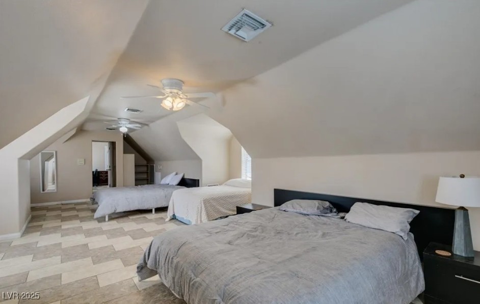 6520 Turtle Hill Road Las Vegas, NV 89110 - Photo 27 of 59 Bedroom with lofted ceiling and a ceiling fan