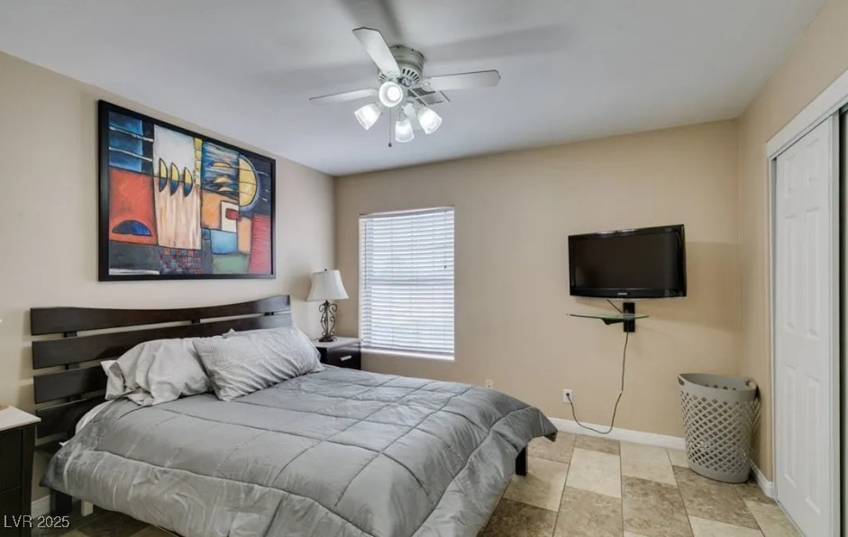 6520 Turtle Hill Road Las Vegas, NV 89110 - Photo 30 of 59 Bedroom featuring a closet and a ceiling fan