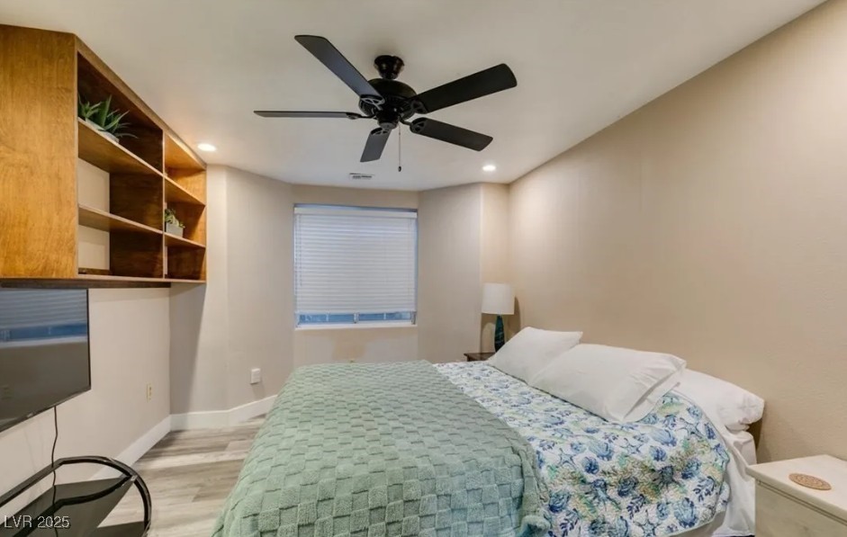 6520 Turtle Hill Road Las Vegas, NV 89110 - Photo 38 of 59 Bedroom featuring light wood-type flooring, ceiling fan, and recessed lighting