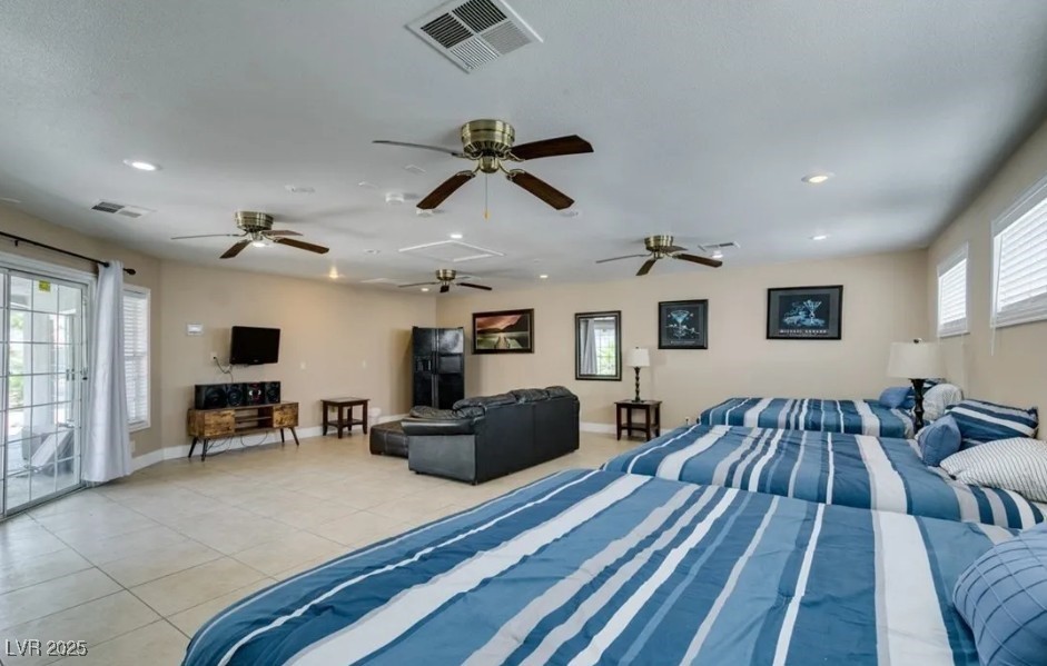 6520 Turtle Hill Road Las Vegas, NV 89110 - Photo 47 of 59 Bedroom with access to outside, light tile patterned floors, and recessed lighting