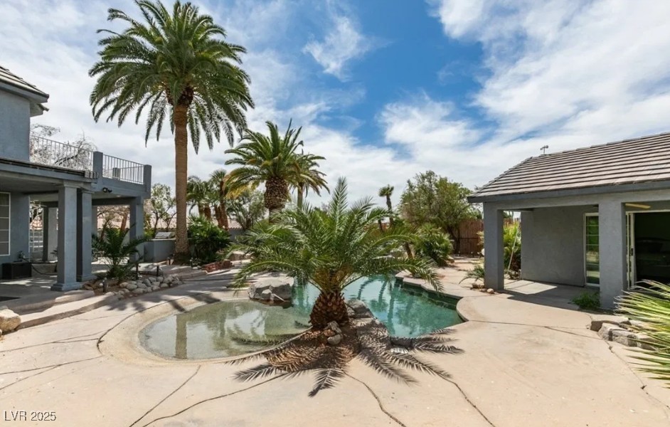 6520 Turtle Hill Road Las Vegas, NV 89110 - Photo 53 of 59 Swimming pool with a patio area