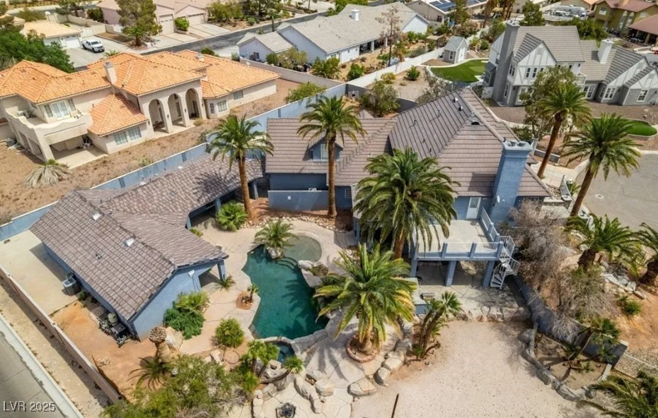 6520 Turtle Hill Road Las Vegas, NV 89110 - Photo 6 of 59 Aerial perspective of suburban area featuring a pool