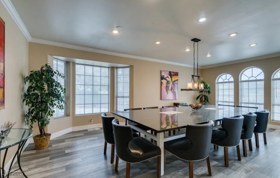 6520 Turtle Hill Road Las Vegas, NV 89110 - Photo 10 of 59 Dining area featuring ornamental molding, light wood-style floors, and recessed lighting