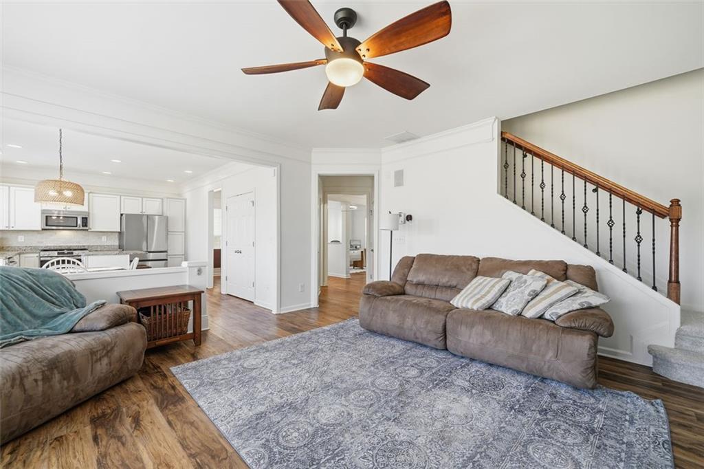503 White Oak Path Canton, GA 30115 - Photo 15 of 47 a living room with furniture and a dining table