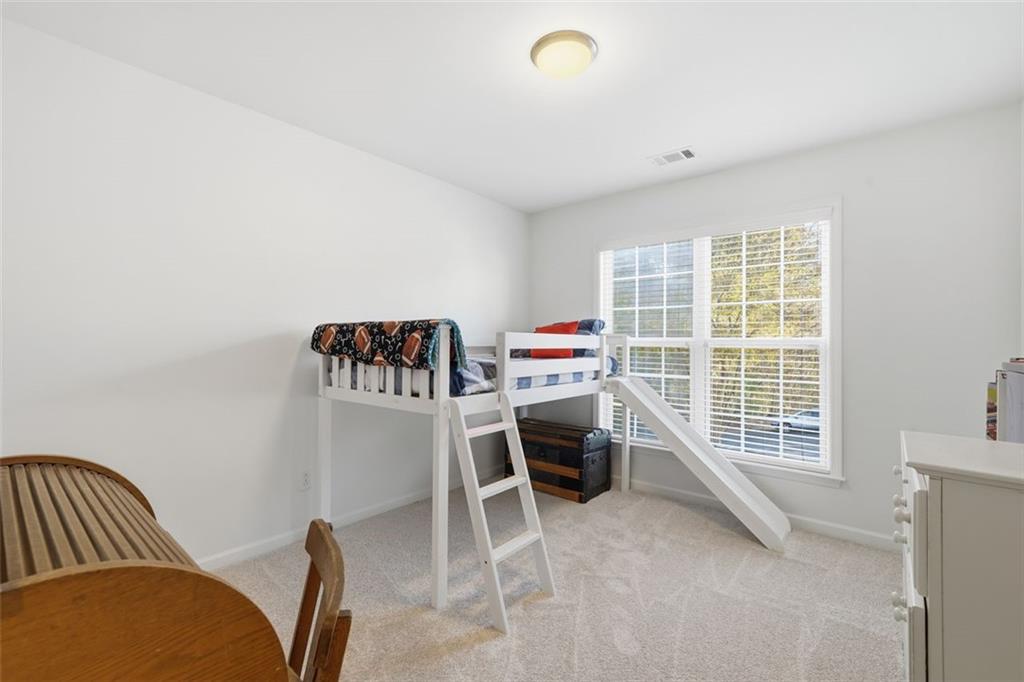 503 White Oak Path Canton, GA 30115 - Photo 27 of 47 a workspace with furniture and a window