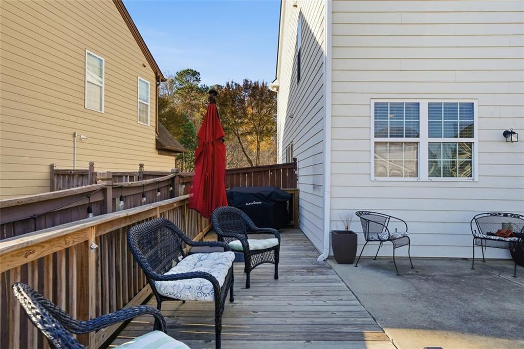 503 White Oak Path Canton, GA 30115 - Photo 40 of 47 a view of a chairs and table on the deck