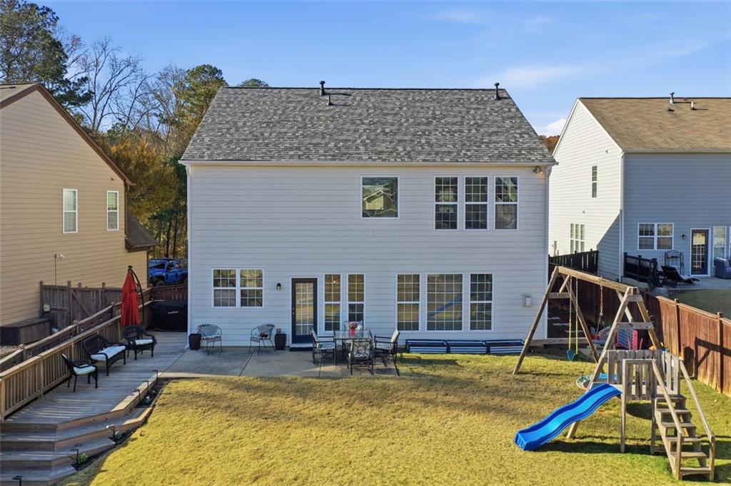503 White Oak Path Canton, GA 30115 - Photo 42 of 47 a view of a house with swimming pool and sitting area