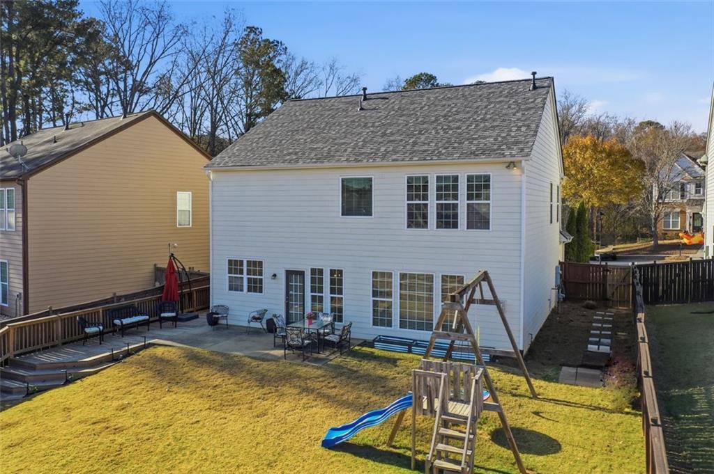 503 White Oak Path Canton, GA 30115 - Photo 43 of 47 a view of a house with swimming pool and sitting area