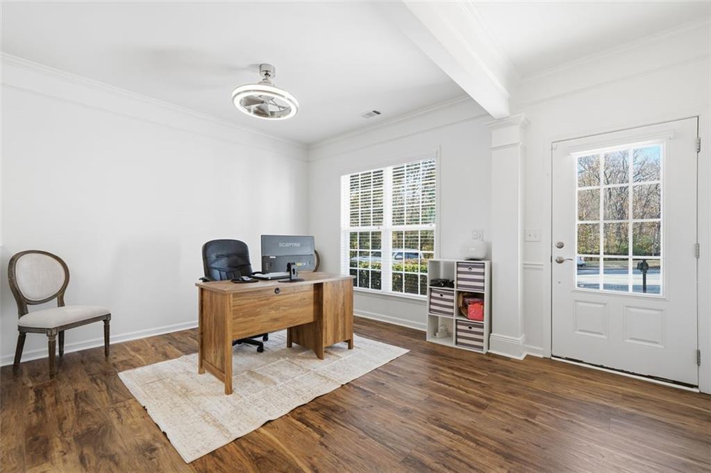 503 White Oak Path Canton, GA 30115 - Photo 8 of 47 a view of a workspace with furniture and a window