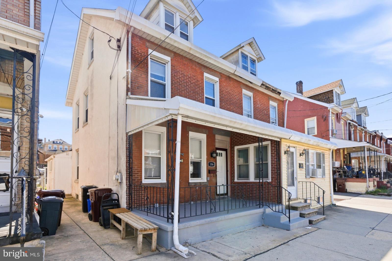 106 West 5th Street Bridgeport, PA 19405 - Photo 1 of 26 a front view of a building with outdoor seating