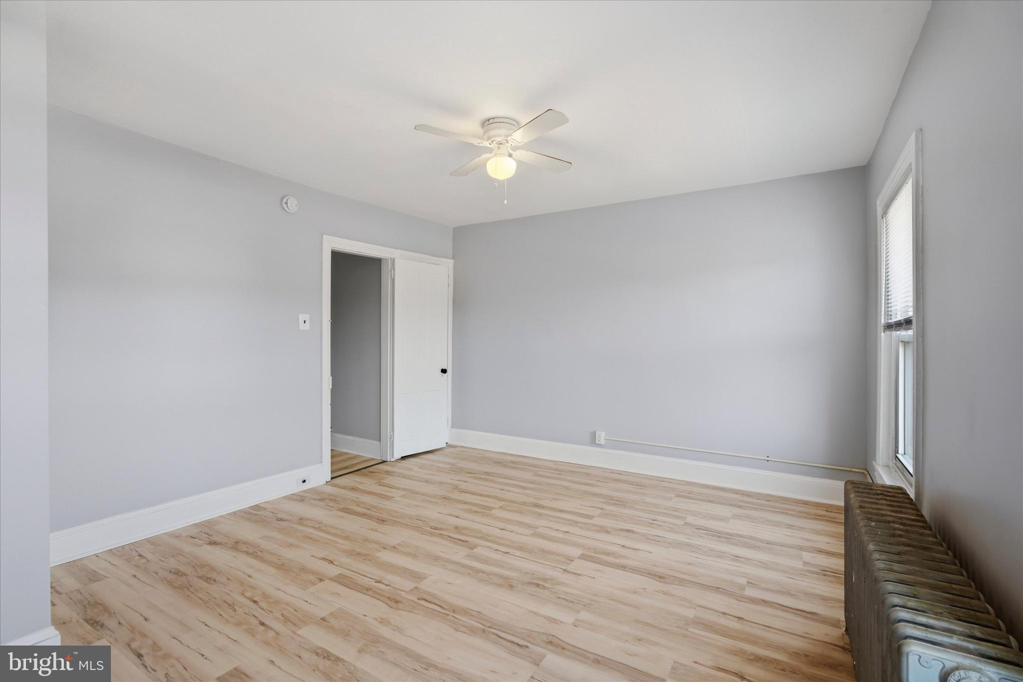 106 West 5th Street Bridgeport, PA 19405 - Photo 18 of 26 a view of an empty room with wooden floor