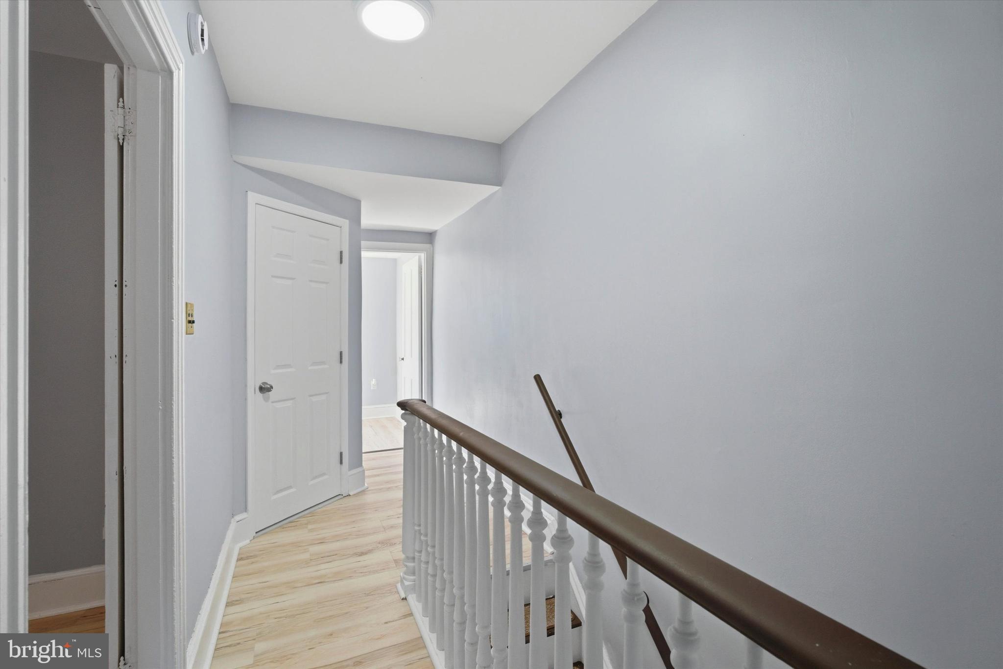 106 West 5th Street Bridgeport, PA 19405 - Photo 19 of 26 a view of a hallway with wooden floor and entryway