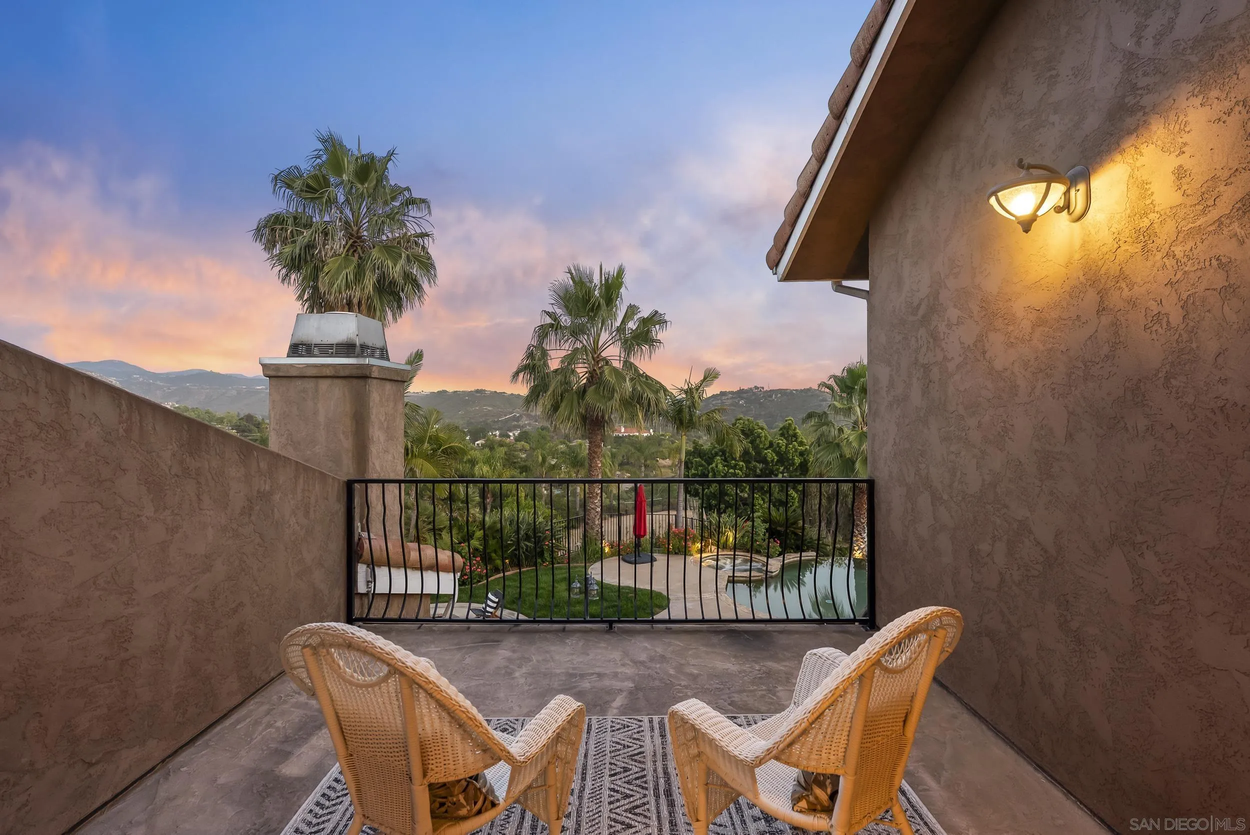 14998 Budwin Lane Poway, CA 92064 - Photo 8 of 44 a view of a chairs and table in patio