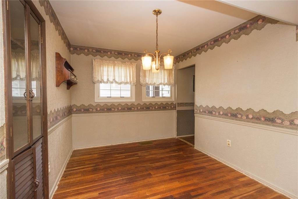1918 Maratta Road Aliquippa, PA 15001 - Photo 11 of 18 Third bedroom currently used as a dining room, the door way comes in from the kitchen and also the hall way (close to the living room)