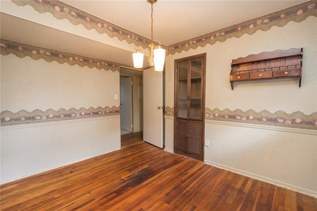 1918 Maratta Road Aliquippa, PA 15001 - Photo 12 of 18 Another picture of the third bedroom used as a dining room, with access from the hall and also the kitchen. The cabinet can be easily turned back into a closet.
