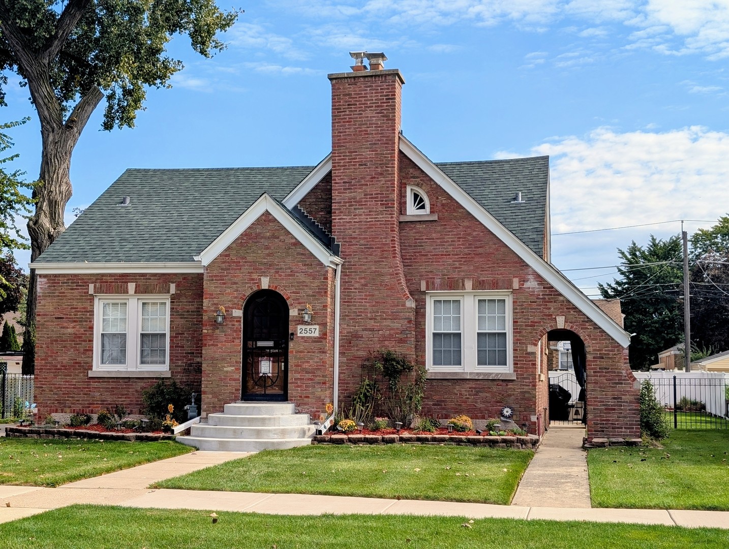2557 Oak Street River Grove, IL 60171 - Photo 1 of 42 a front view of a house with a yard