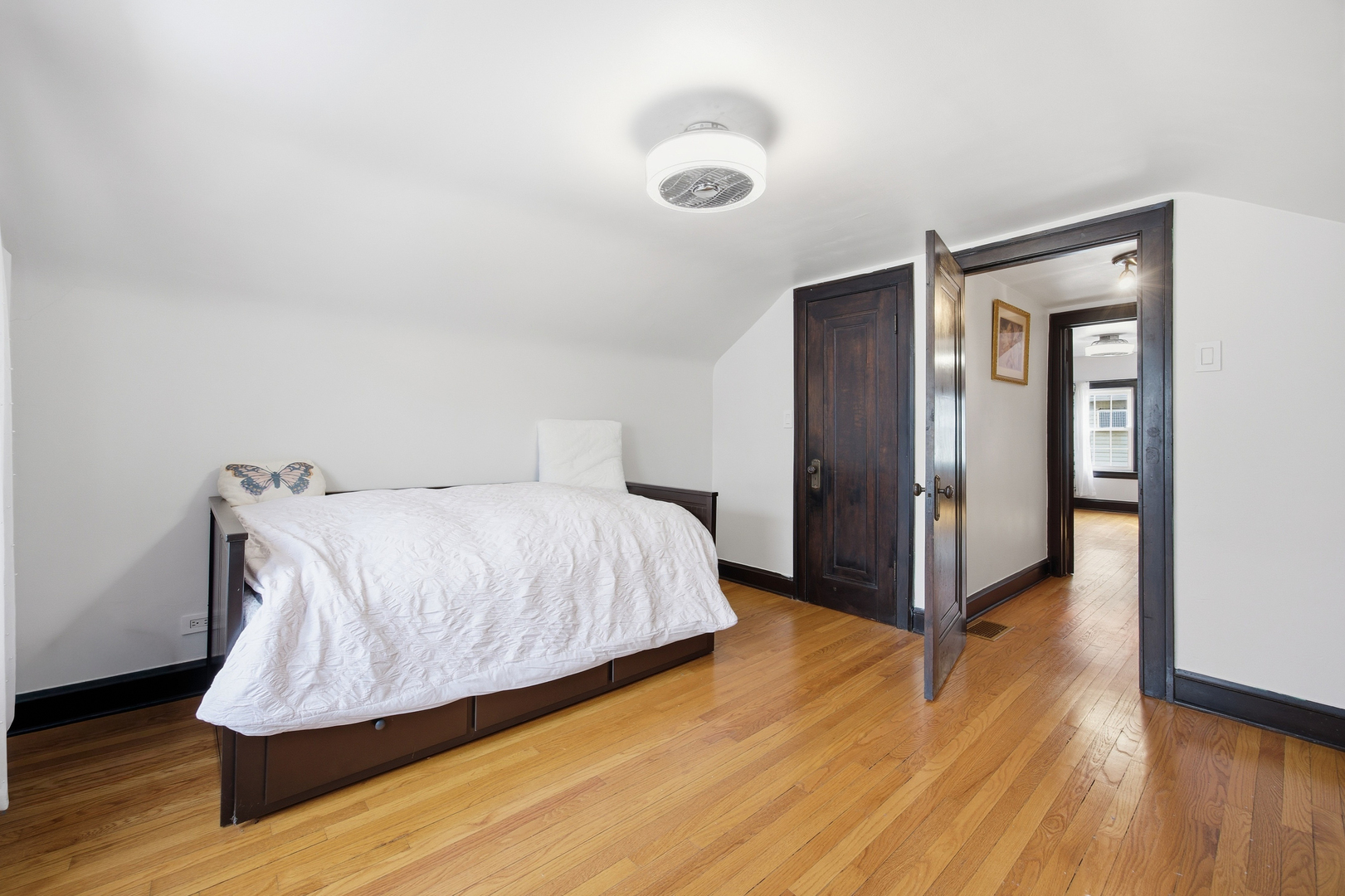 2557 Oak Street River Grove, IL 60171 - Photo 16 of 42 a bedroom with a bed and wooden floor