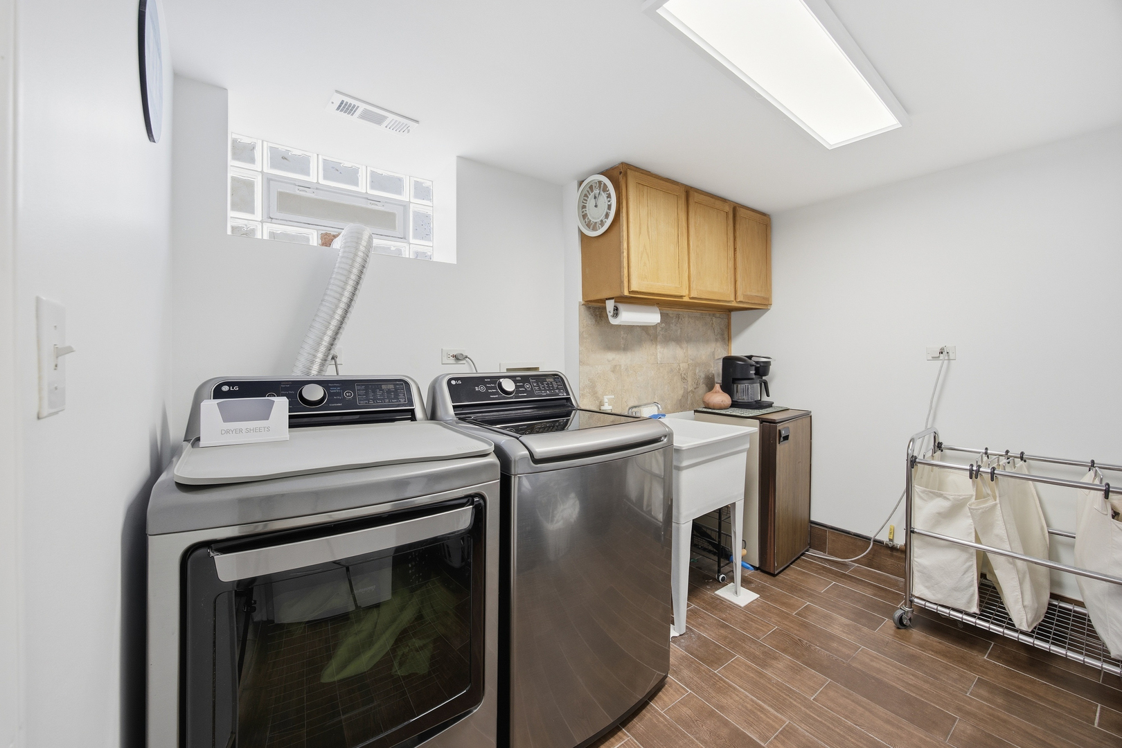 2557 Oak Street River Grove, IL 60171 - Photo 24 of 42 a view of a storage and utility room with washer and dryer