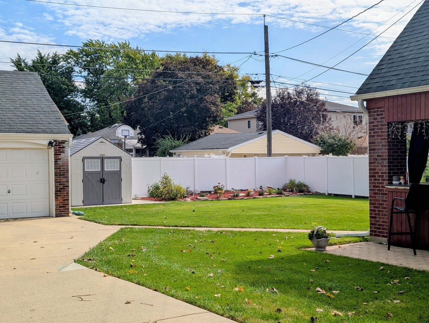 2557 Oak Street River Grove, IL 60171 - Photo 32 of 42 a front view of a house with garden