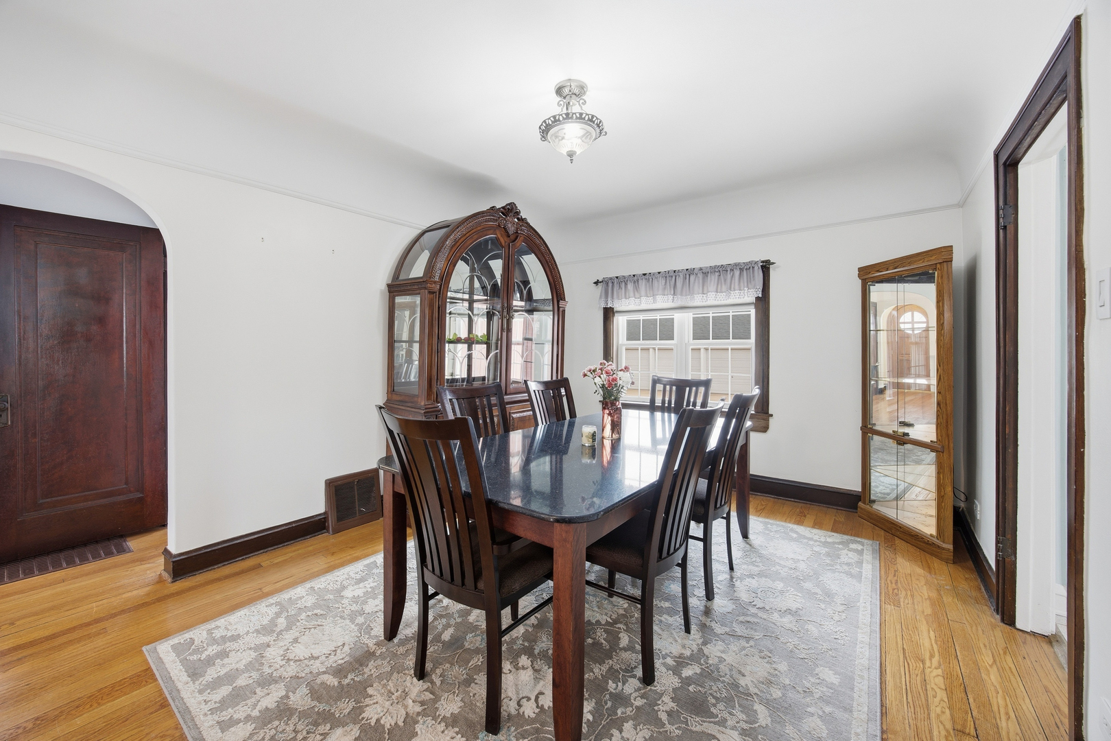 2557 Oak Street River Grove, IL 60171 - Photo 5 of 42 a view of a dining room with furniture and wooden floor