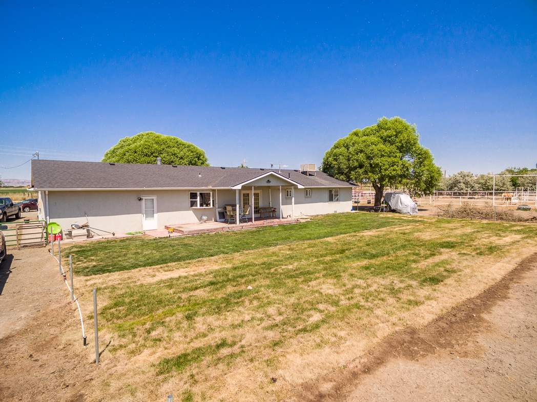 936 22 Road Grand Junction, CO 81505 - Photo 3 of 42 a front view of a house with a yard