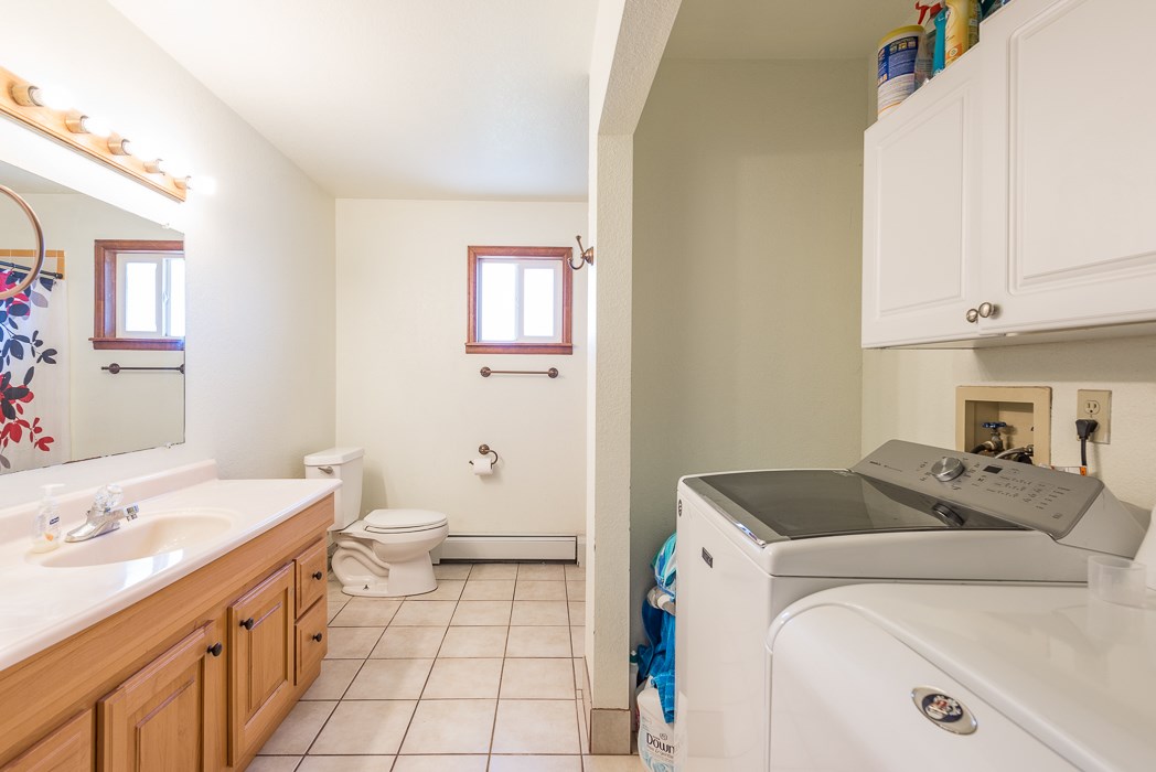 936 22 Road Grand Junction, CO 81505 - Photo 38 of 42 a utility room with a sink a washer and dryer