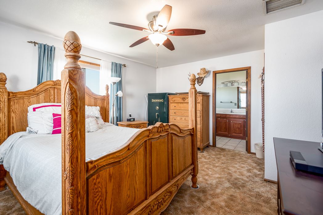 936 22 Road Grand Junction, CO 81505 - Photo 41 of 42 a bedroom with furniture and wooden floor