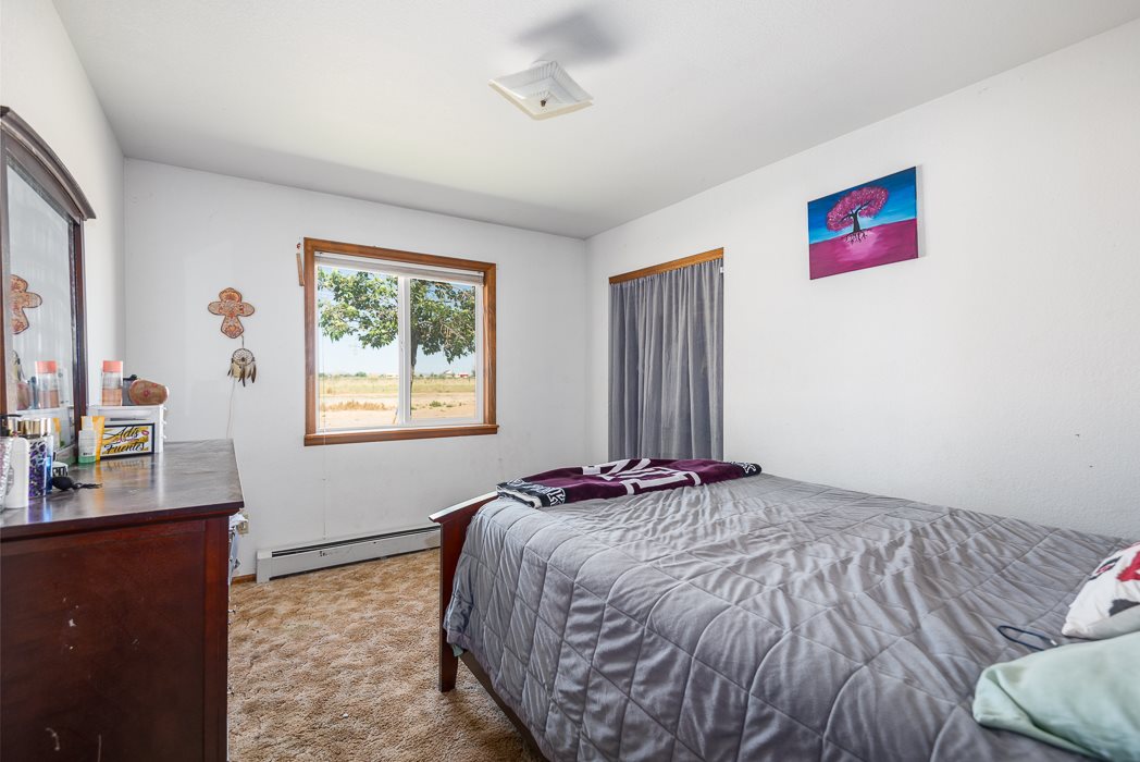 936 22 Road Grand Junction, CO 81505 - Photo 42 of 42 a bedroom with a bed and a window