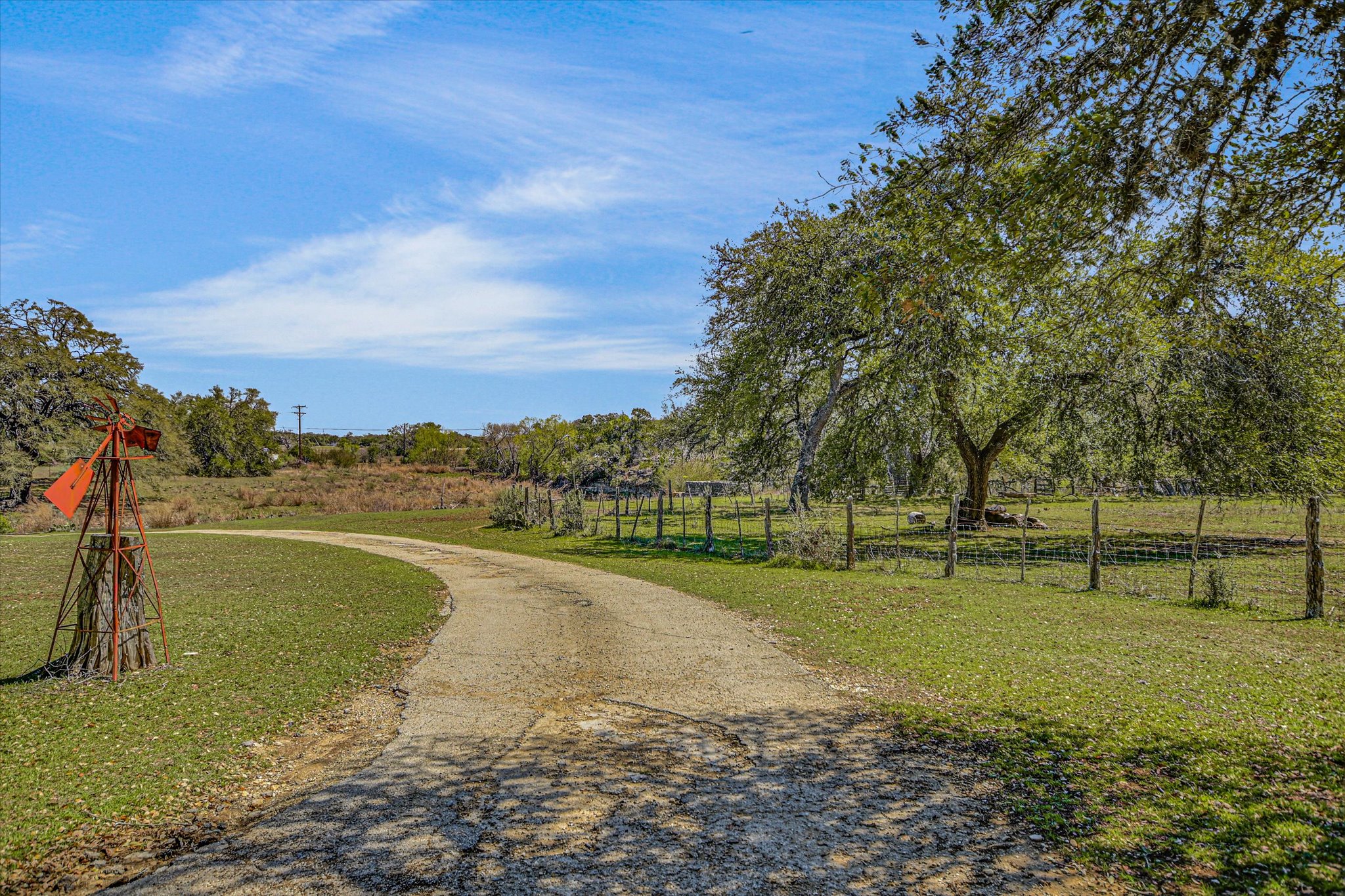 5421 Purgatory Road San Marcos, TX 78666 - Photo 3 of 38 a view of a lake with a big yard