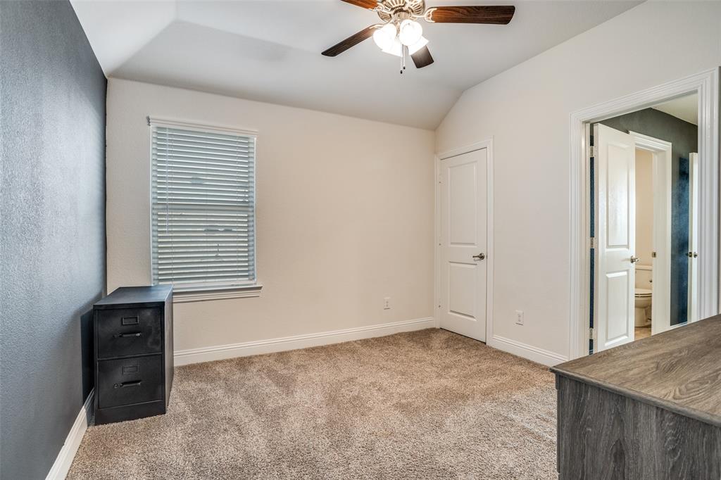 10421 Table Blf Street Aubrey, TX 76227 - Photo 14 of 25 a view of an empty room with a window