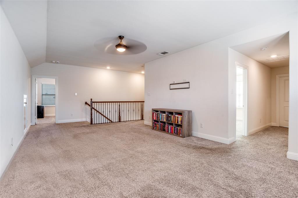 10421 Table Blf Street Aubrey, TX 76227 - Photo 17 of 25 a view of an empty room