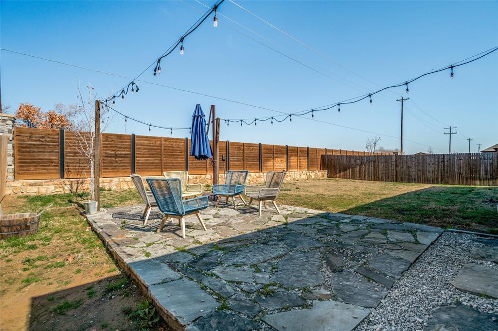 10421 Table Blf Street Aubrey, TX 76227 - Photo 24 of 25 a view of a swimming pool with a patio