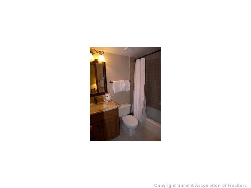 800 Copper Road, Unit 272 Copper Mountain, CO 80443 - Photo 8 of 12 a bathroom with a sink and a toilet